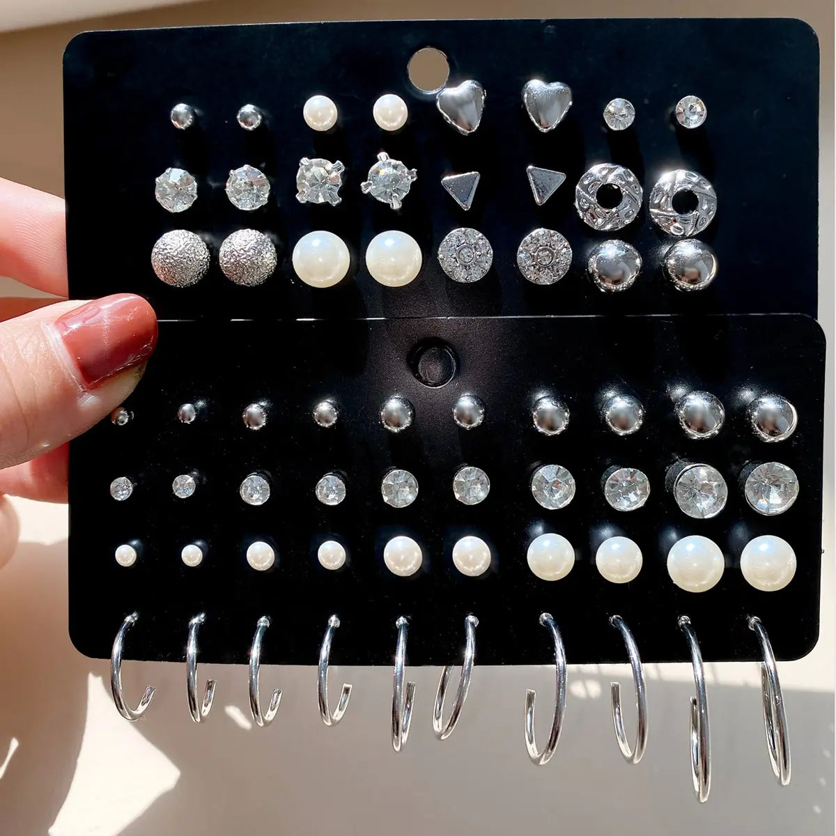 32 Pairs Of Pearl Earrings